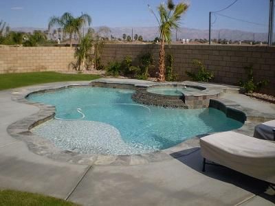 On location at Crystal Clear Pool Service, a Swimming Pool and Hot Tub Installation in Fresno, CA